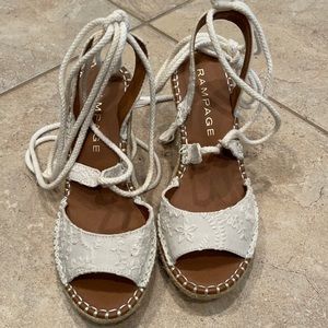 White wedge sandals.